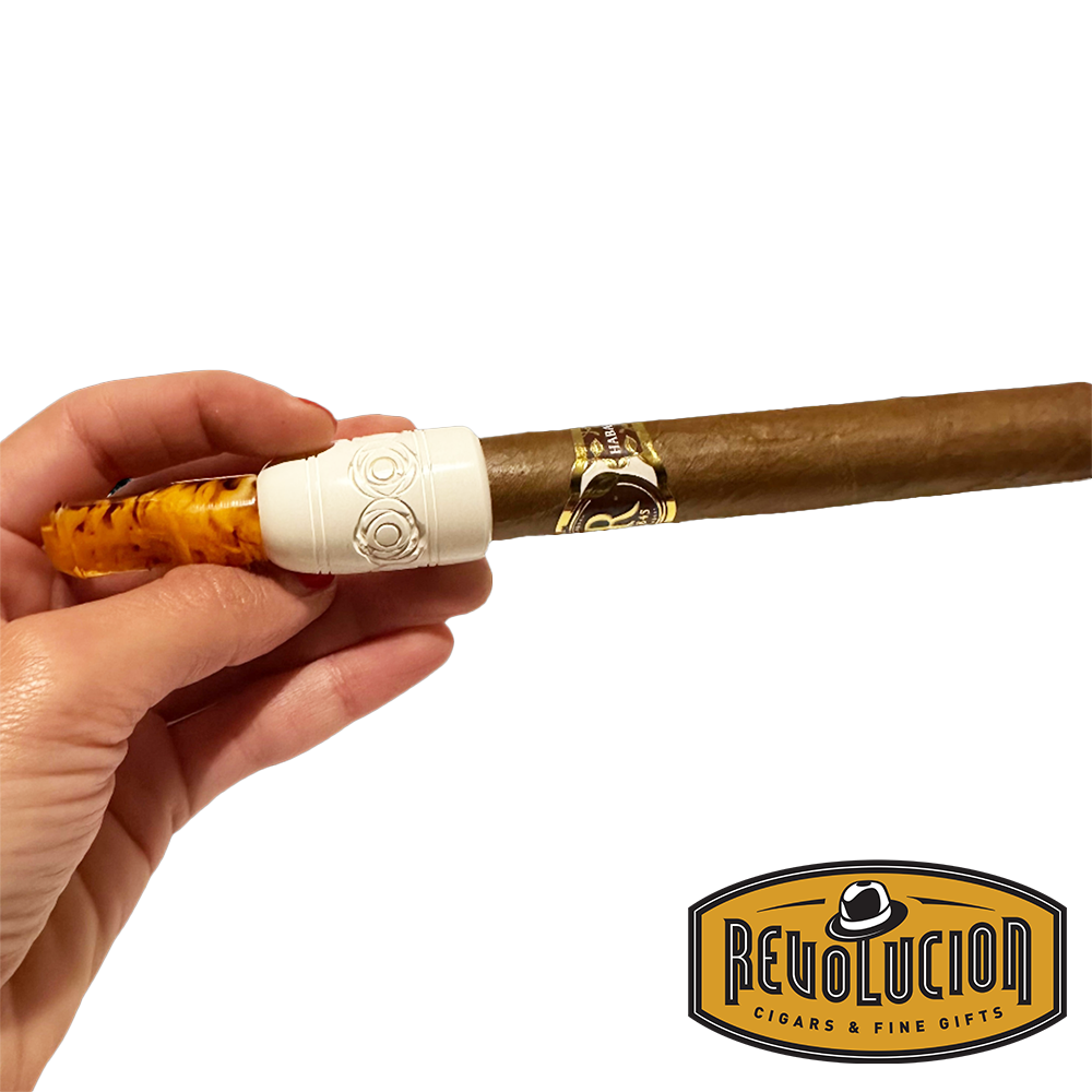 Medium-sized Meerschaum cigar holder with a cigar, emphasizing its classic and practical design.