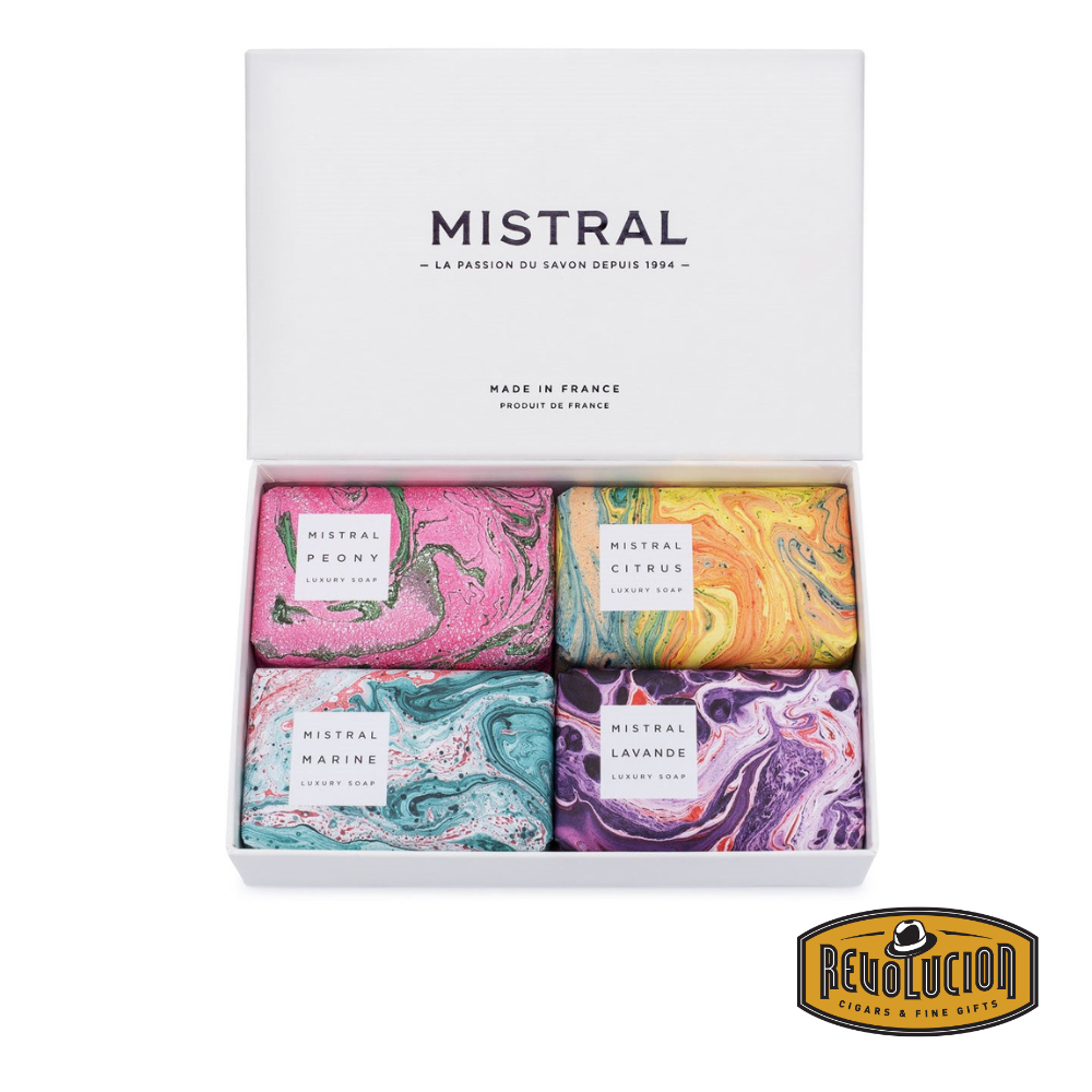 Elegant Mistral luxury soap gift set in a sleek white box, featuring four vibrant, marbled soap designs: Peony, Citrus, Marine, and Lavande. Made in France and perfect for building your own personalized gift. Includes the Revolucion Cigars & Fine Gifts logo